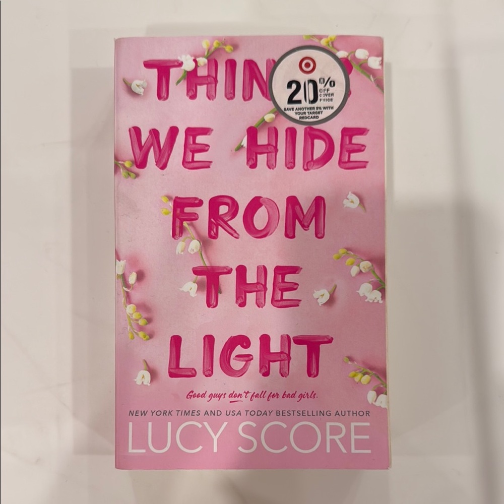 Pink Book 'Things We Hide from the Light' by Lucy Score